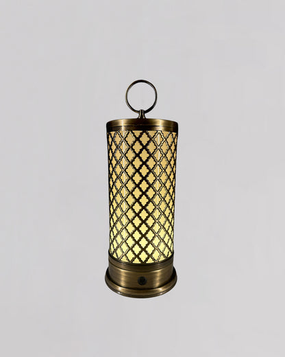 Decorative lantern with lattice design and glowing interior on a gray background
