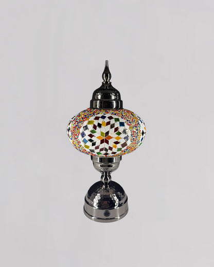 Decorative lamp with a colorful geometric design on a gray background