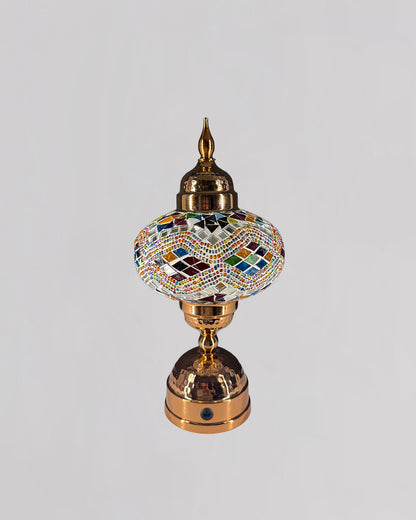 Decorative lamp with mosaic design on a gray background
