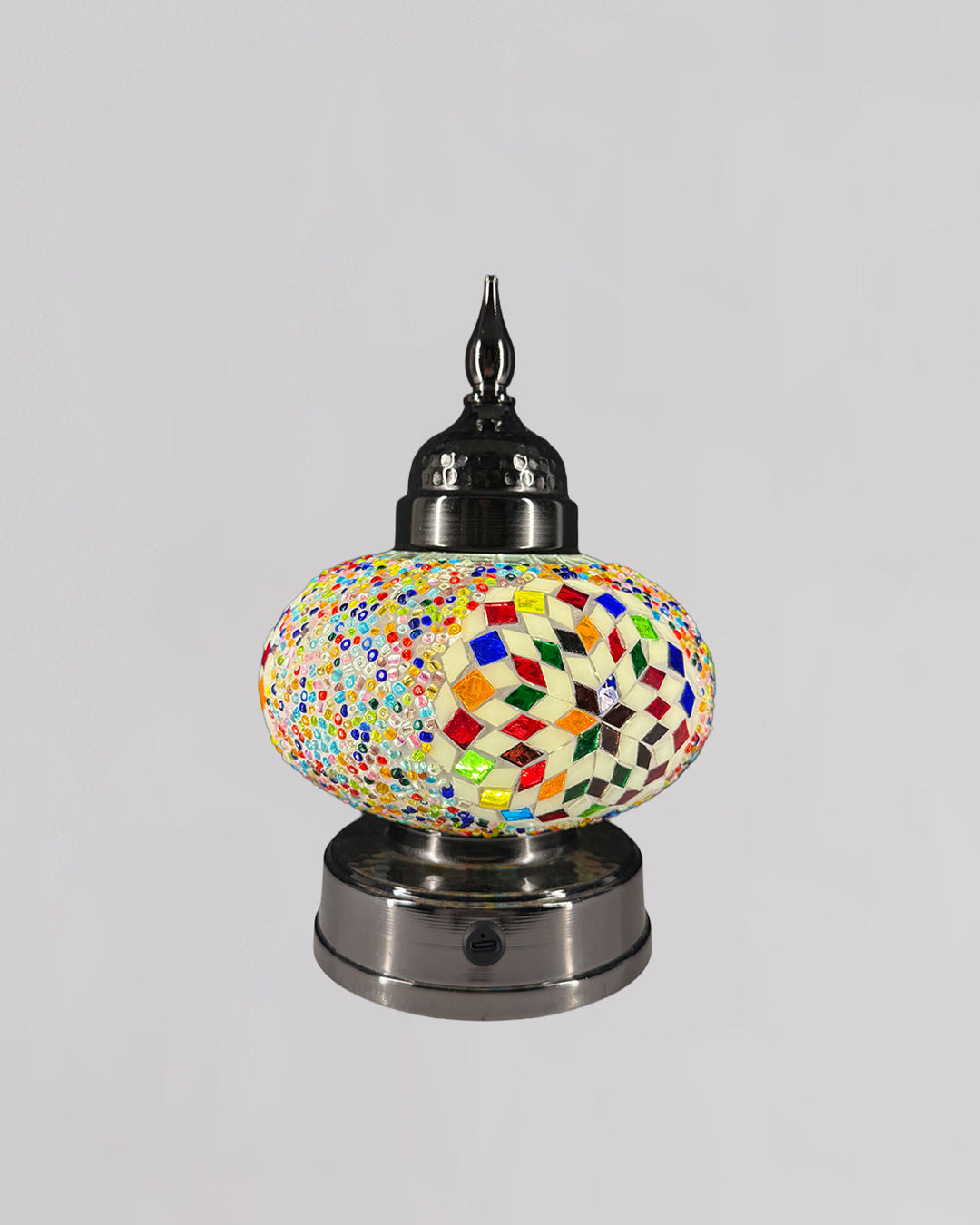 Decorative lamp with a multicolored mosaic design on a gray background