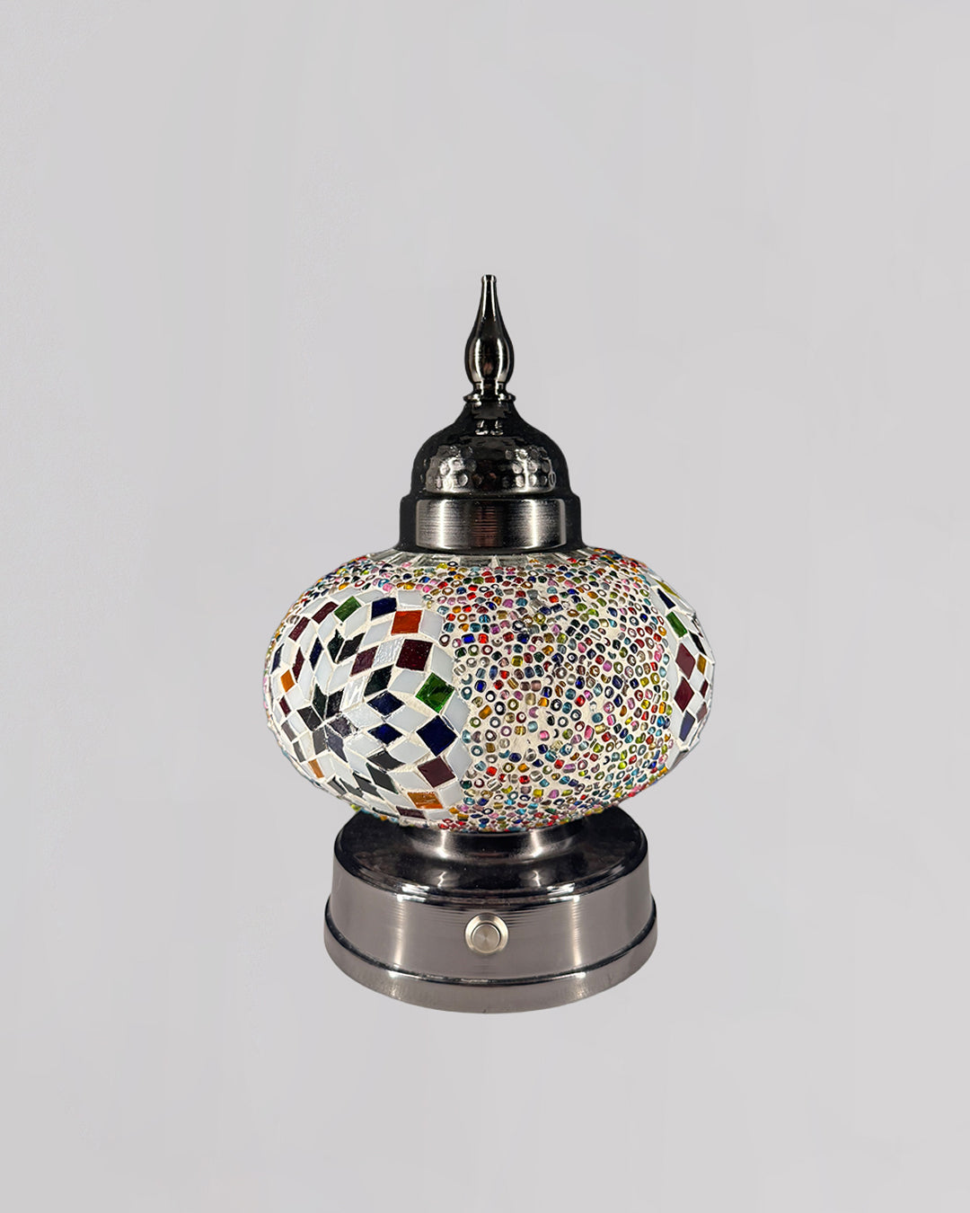 Decorative lamp with mosaic design on a gray background